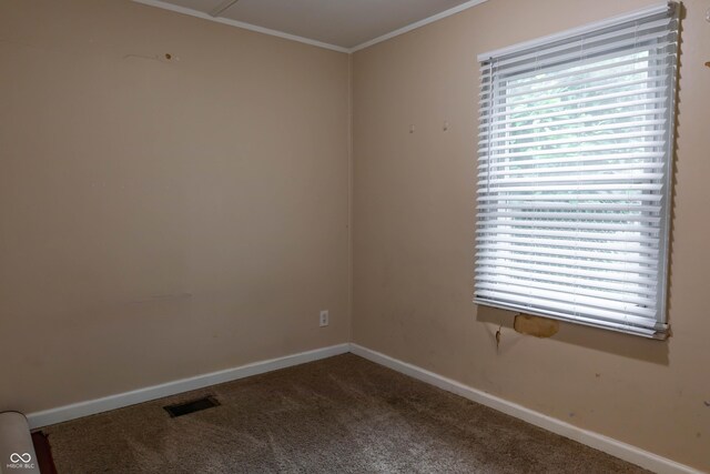 2620 13th St, Columbus, IN 47201 - carpeted spare room with baseboards and ornamental molding