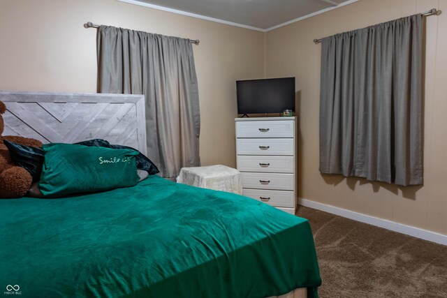 2620 13th St, Columbus, IN 47201 - bedroom with dark colored carpet, baseboards, and crown molding