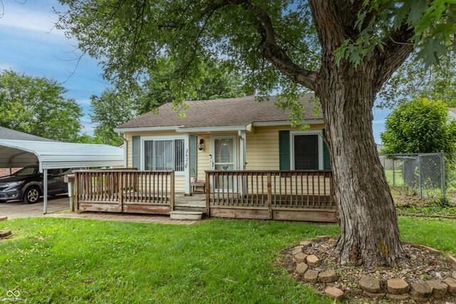 2620 13th St, Columbus, IN 47201 - view of front facade featuring a wooden deck and roof with shingles