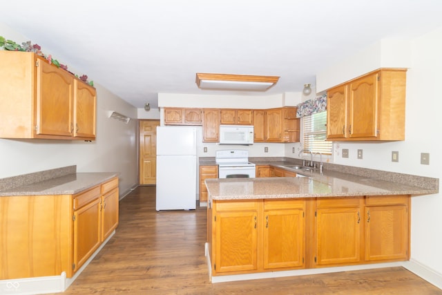 391 W 500 S, Anderson, IN 46013 - kitchen with white appliances, a peninsula, light wood-style flooring, and brown cabinetry