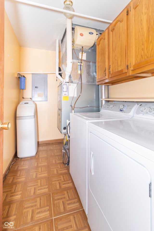 391 W 500 S, Anderson, IN 46013 - laundry area with electric panel, washer and dryer, and cabinet space