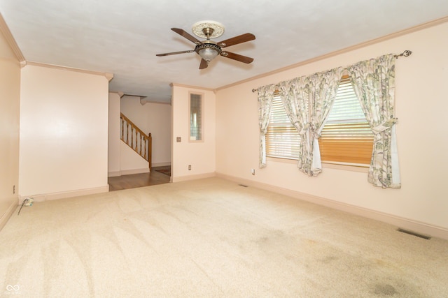 391 W 500 S, Anderson, IN 46013 - empty room with carpet, ornamental molding, a ceiling fan, and stairs