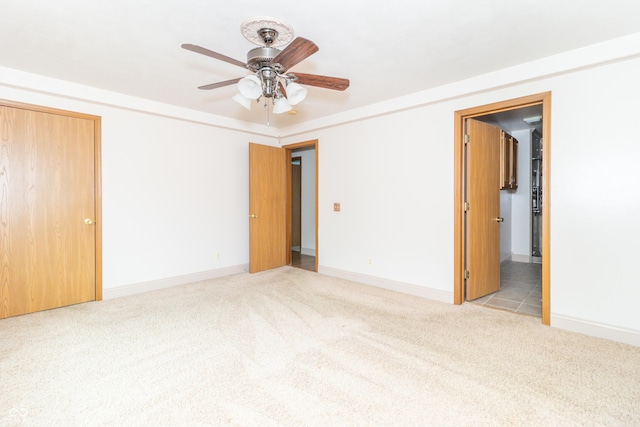 391 W 500 S, Anderson, IN 46013 - unfurnished room with light colored carpet and ceiling fan
