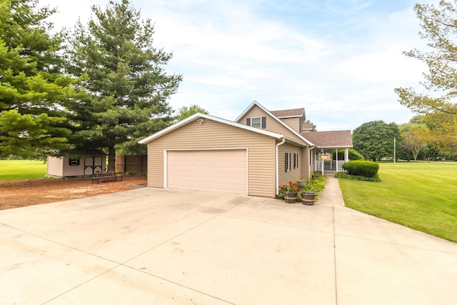 391 W 500 S, Anderson, IN 46013 - traditional home with an attached garage, a storage shed, and concrete driveway