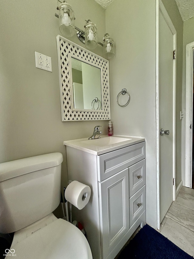 419 N 14th Ave, Beech Grove, IN 46107 - bathroom with toilet and vanity