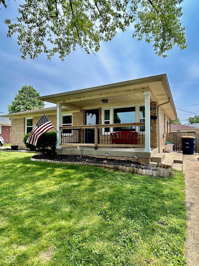 419 N 14th Ave, Beech Grove, IN 46107 - back of house featuring brick siding and covered porch
