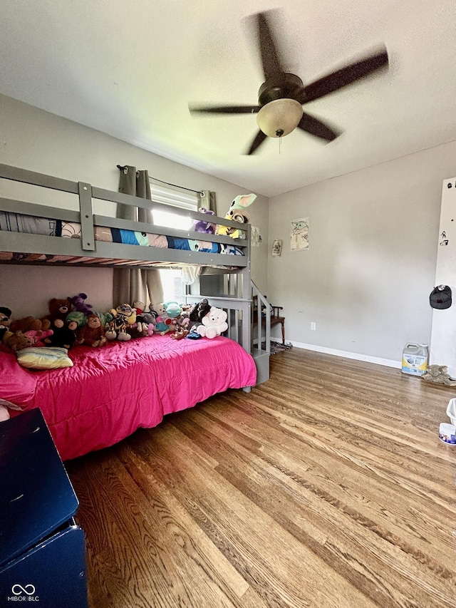 419 N 14th Ave, Beech Grove, IN 46107 - bedroom featuring wood finished floors and a ceiling fan