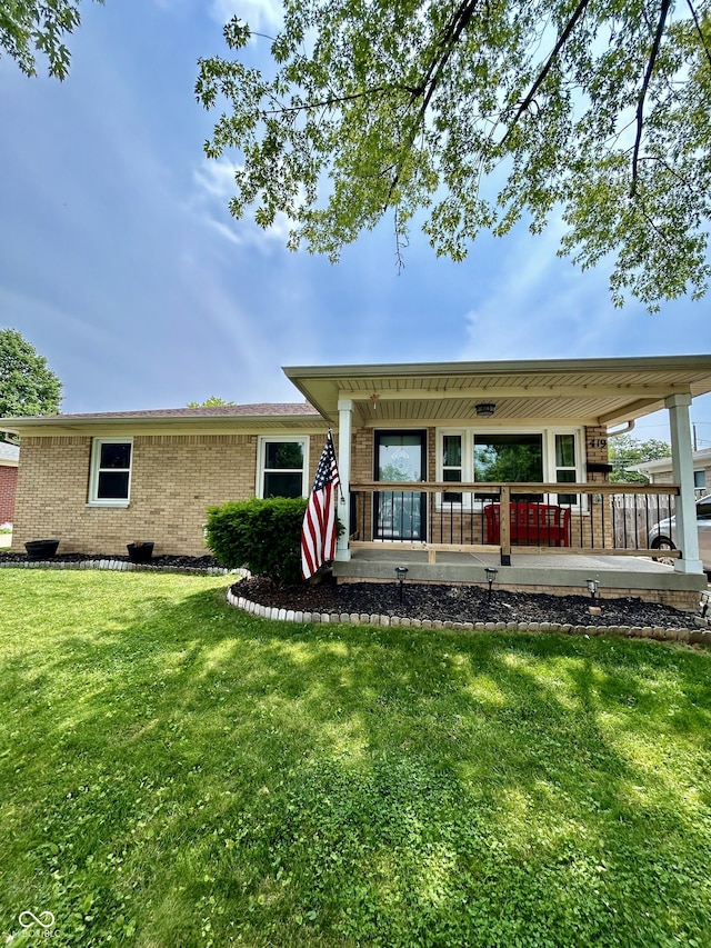 419 N 14th Ave, Beech Grove, IN 46107 - view of front of home featuring a front yard and brick siding