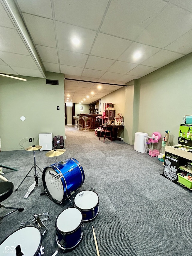 419 N 14th Ave, Beech Grove, IN 46107 - playroom with carpet floors, a bar, and a paneled ceiling