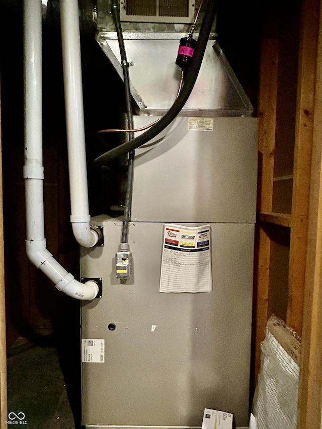 419 N 14th Ave, Beech Grove, IN 46107 - utility room featuring heating unit