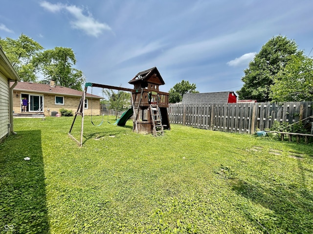 419 N 14th Ave, Beech Grove, IN 46107 - fenced backyard featuring a playground