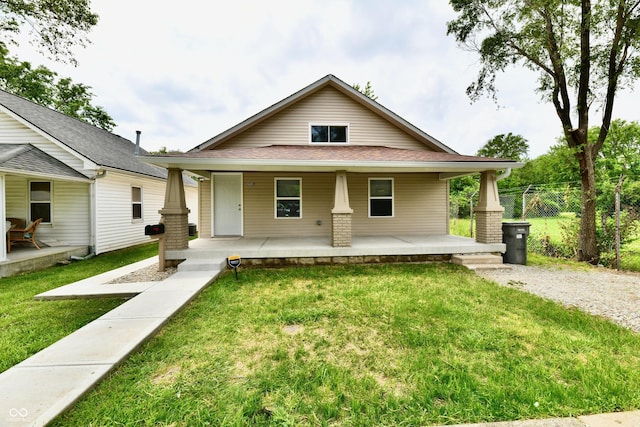 2026 Spruce St, Indianapolis, IN 46203 - view of front facade with a porch