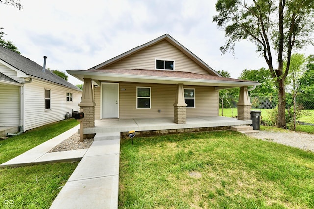 2026 Spruce St, Indianapolis, IN 46203 - view of front facade featuring a porch