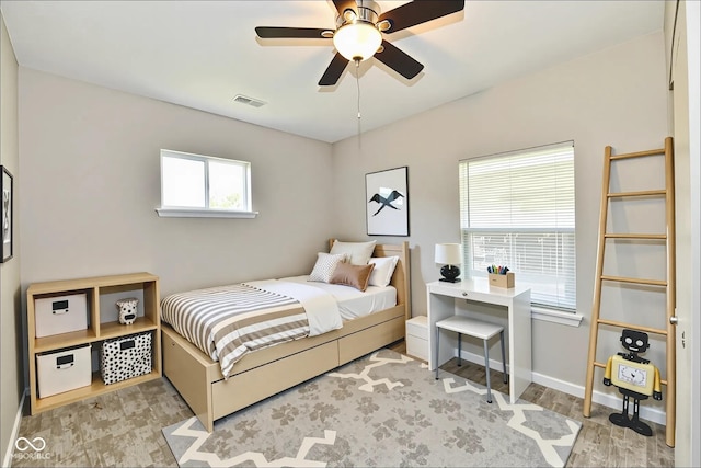 2026 Spruce St, Indianapolis, IN 46203 - bedroom with baseboards and ceiling fan