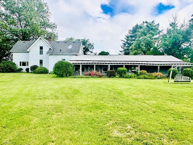 317 W State Road 44, Franklin, IN 46131 - back of property with a yard and a chimney