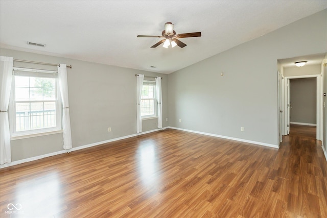 18005 Gasparilla Ct, Westfield, IN 46062 - spare room with a ceiling fan, lofted ceiling, plenty of natural light, and wood finished floors