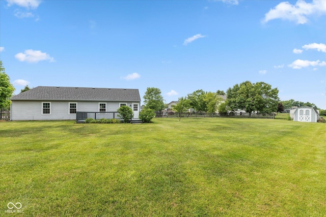 18005 Gasparilla Ct, Westfield, IN 46062 - view of yard featuring a storage shed and a wooden deck