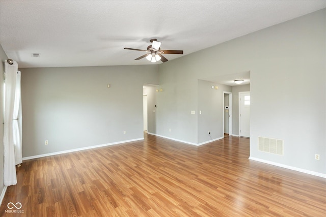 18005 Gasparilla Ct, Westfield, IN 46062 - empty room with ceiling fan, lofted ceiling, and light wood-type flooring