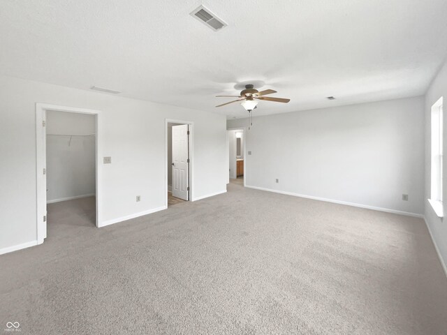 8437 Crosser Dr, Indianapolis, IN 46237 - spare room with a ceiling fan, carpet, and baseboards