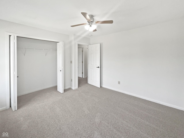8437 Crosser Dr, Indianapolis, IN 46237 - unfurnished bedroom with baseboards, carpet flooring, a closet, and a ceiling fan