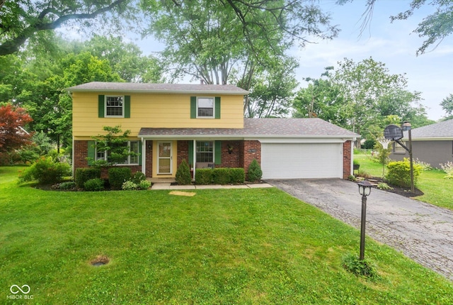 7223 Marla Dr, Indianapolis, IN 46256 - traditional-style house featuring driveway, brick siding, a garage, and a front yard