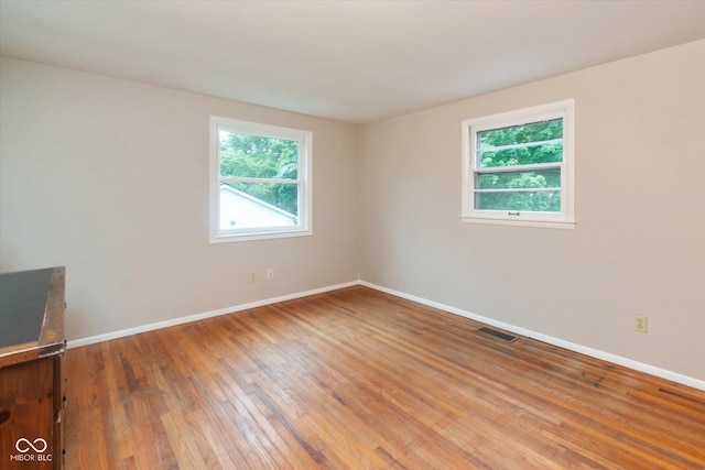 7223 Marla Dr, Indianapolis, IN 46256 - empty room with hardwood / wood-style flooring and baseboards