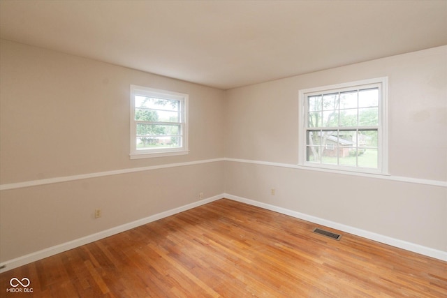 7223 Marla Dr, Indianapolis, IN 46256 - spare room featuring light wood-type flooring and baseboards