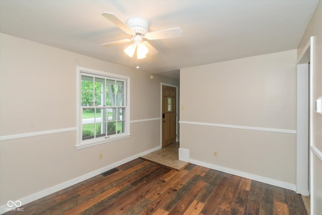 7223 Marla Dr, Indianapolis, IN 46256 - empty room featuring dark wood-style flooring and ceiling fan