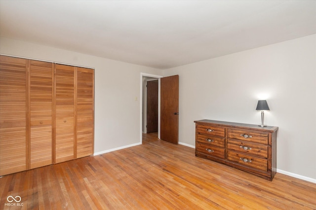 7223 Marla Dr, Indianapolis, IN 46256 - bedroom featuring light wood-type flooring and a closet
