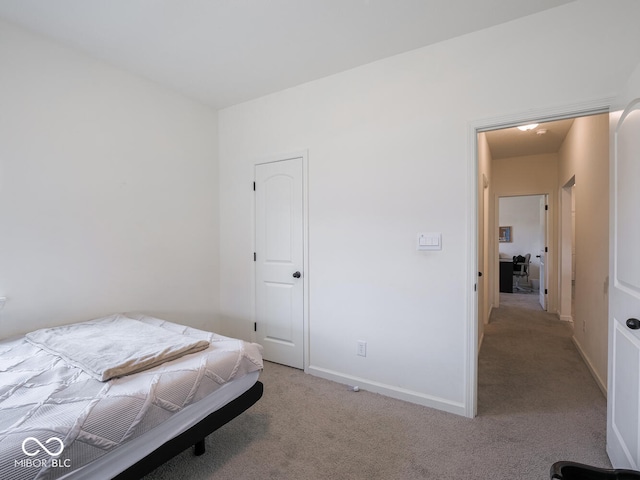 9001 Fitzgerald Dr, Indianapolis, IN 46239 - bedroom featuring light carpet and baseboards