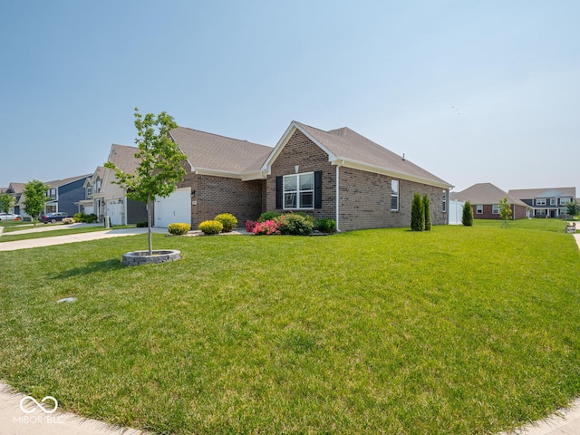 9001 Fitzgerald Dr, Indianapolis, IN 46239 - ranch-style house featuring brick siding, a garage, a front yard, and concrete driveway