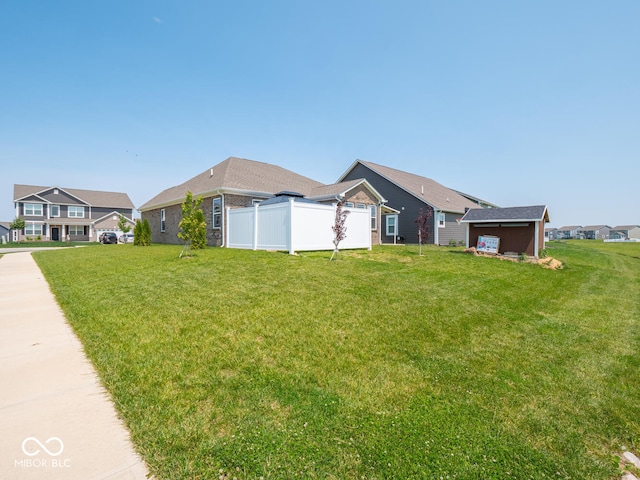9001 Fitzgerald Dr, Indianapolis, IN 46239 - view of property exterior featuring a residential view