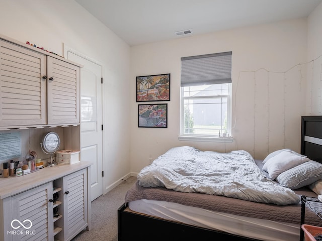 9001 Fitzgerald Dr, Indianapolis, IN 46239 - bedroom featuring light colored carpet and baseboards