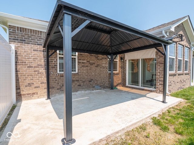 9001 Fitzgerald Dr, Indianapolis, IN 46239 - view of patio / terrace featuring a carport and a gazebo