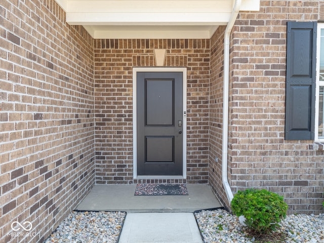 9001 Fitzgerald Dr, Indianapolis, IN 46239 - view of exterior entry featuring brick siding