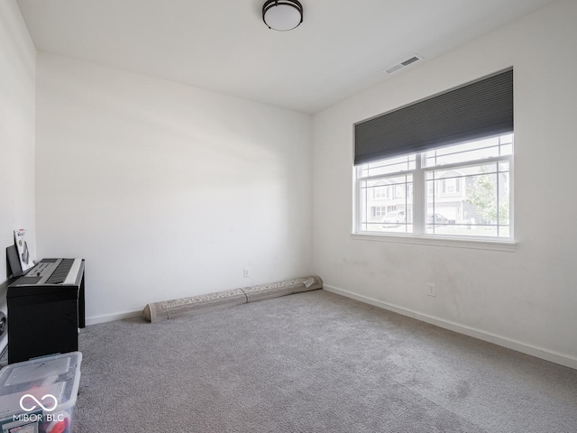 9001 Fitzgerald Dr, Indianapolis, IN 46239 - spare room with carpet flooring and baseboards