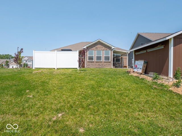 9001 Fitzgerald Dr, Indianapolis, IN 46239 - rear view of house with brick siding