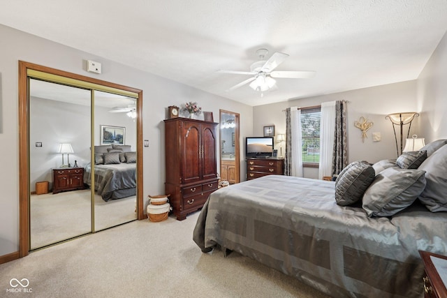 1027 Plum St Unit 39, Brownsburg, IN 46112 - bedroom featuring light colored carpet, a ceiling fan, and a closet