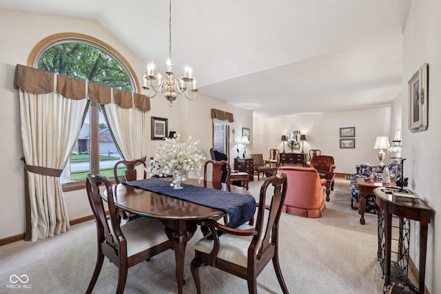 1027 Plum St Unit 39, Brownsburg, IN 46112 - dining area featuring light carpet, a chandelier, plenty of natural light, and lofted ceiling
