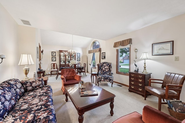 1027 Plum St Unit 39, Brownsburg, IN 46112 - living area with light colored carpet, a chandelier, and lofted ceiling