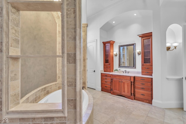 10471 Winghaven Dr, Noblesville, IN 46060 - full bathroom featuring vanity, a bath, ornamental molding, and recessed lighting