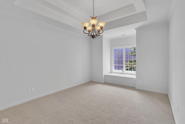 10471 Winghaven Dr, Noblesville, IN 46060 - carpeted spare room with ornamental molding, a tray ceiling, and a chandelier