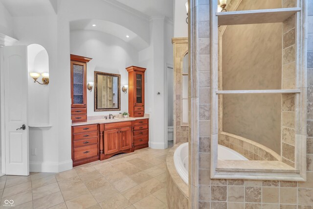 10471 Winghaven Dr, Noblesville, IN 46060 - full bathroom featuring a garden tub, vanity, crown molding, a tile shower, and recessed lighting