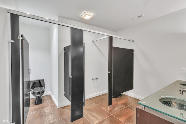 10471 Winghaven Dr, Noblesville, IN 46060 - bathroom featuring tile patterned flooring and double vanity