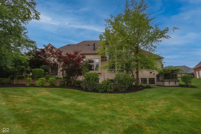 10471 Winghaven Dr, Noblesville, IN 46060 - view of grassy yard with a hot tub