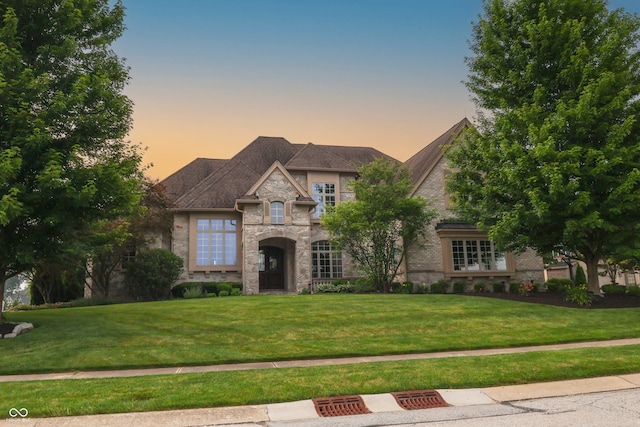 10471 Winghaven Dr, Noblesville, IN 46060 - french country style house with stone siding and a yard