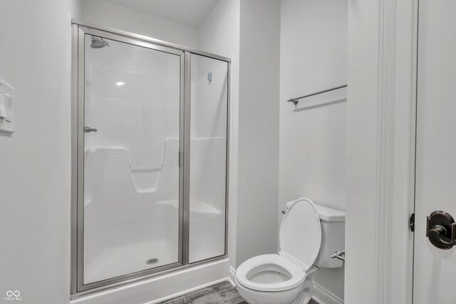 10471 Winghaven Dr, Noblesville, IN 46060 - full bathroom featuring a stall shower and toilet