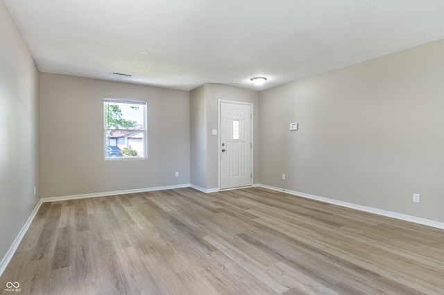 3351 Summer Breeze Cir, Indianapolis, IN 46239 - entrance foyer with light wood-style floors and baseboards