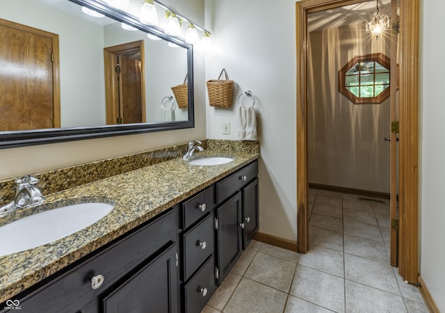 421 Kingsway Ct, Mooresville, IN 46158 - full bathroom featuring double vanity, tile patterned flooring, and baseboards