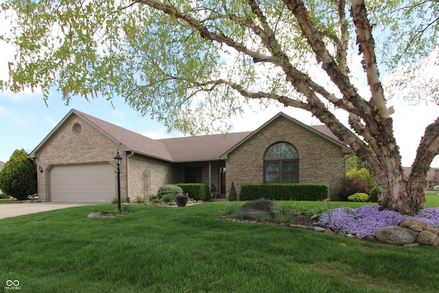 421 Kingsway Ct, Mooresville, IN 46158 - single story home featuring brick siding, a garage, a front yard, and concrete driveway